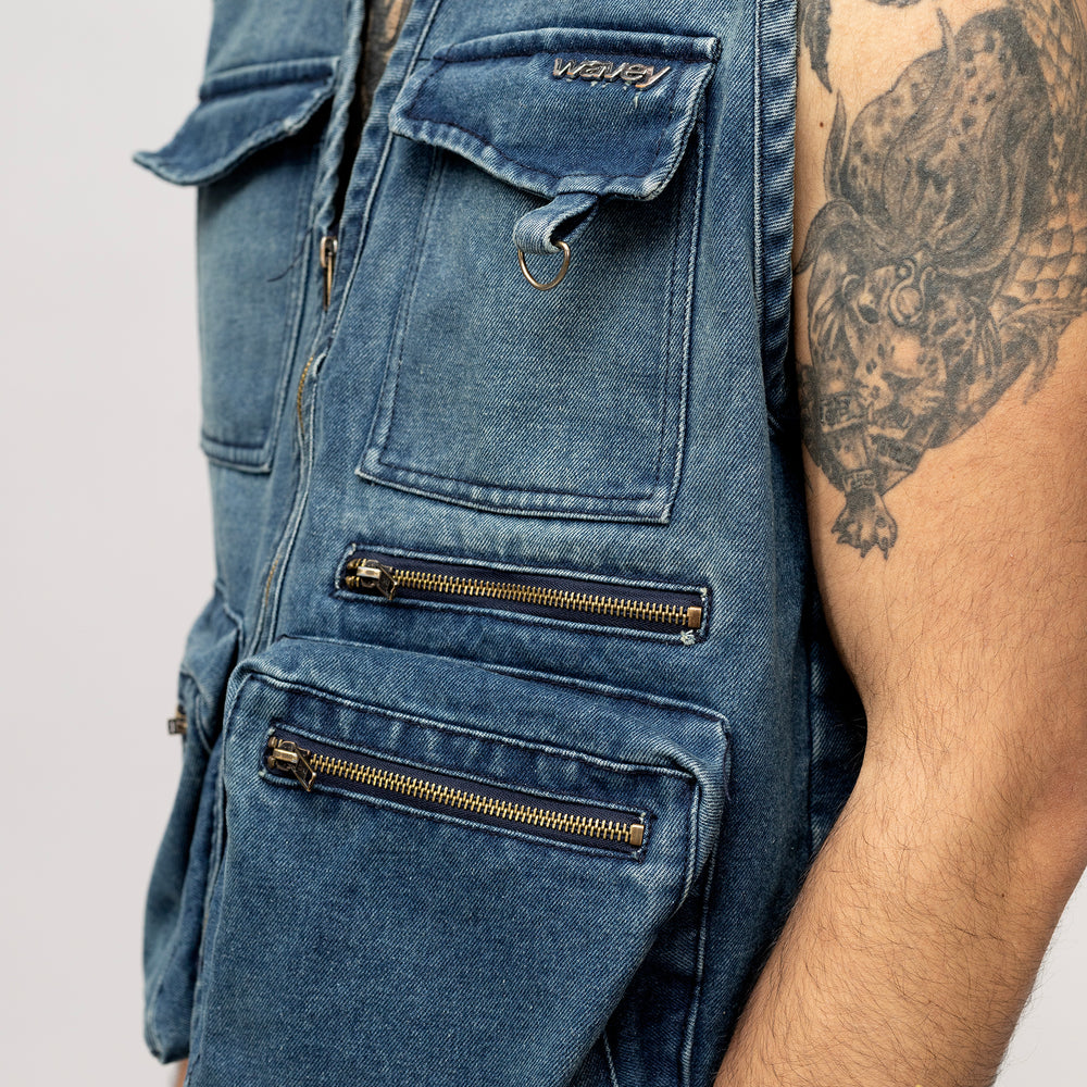 
                      
                        BLUE DENIM VEST
                      
                    